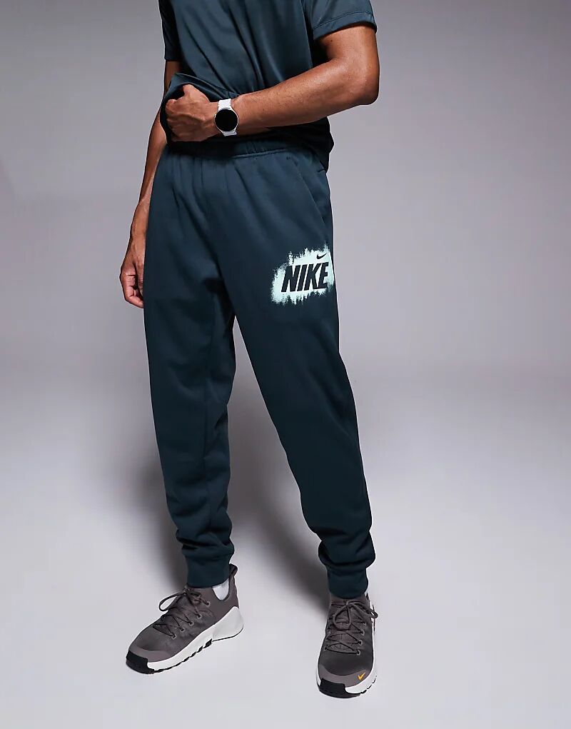 

Джоггеры Nike Training Heritage зеленого цвета