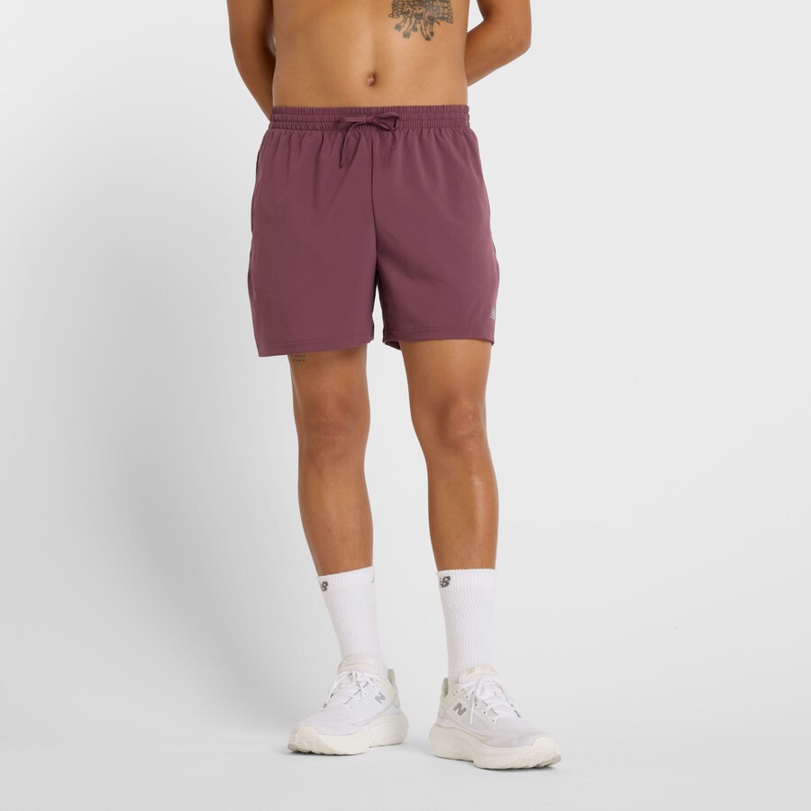

Тренировочные брюки new balance Essentials, цвет Blackberry