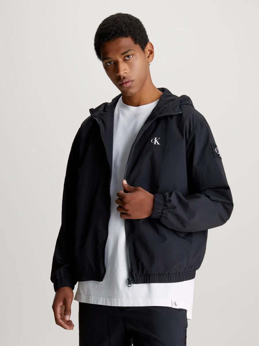 

Ветровка Calvin Klein Jeans "WINDBREAKER", с капюшоном, с логотипом Calvin Klein, цвет Ck Black