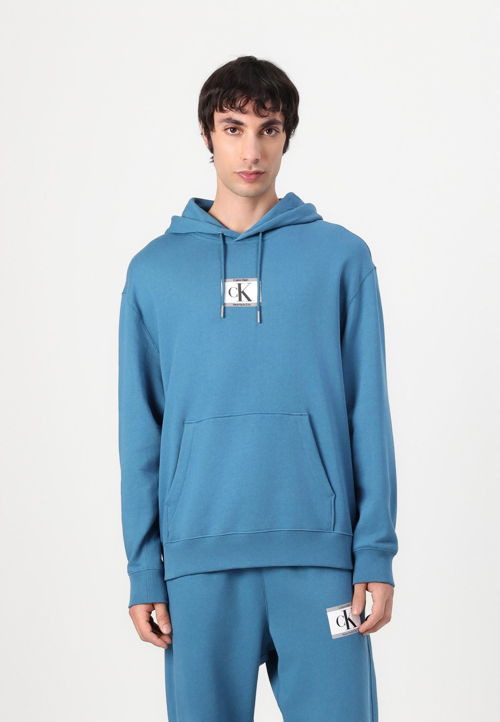 

Толстовка с капюшоном UNISEX - Sweatshirt Calvin Klein, светло-голубой