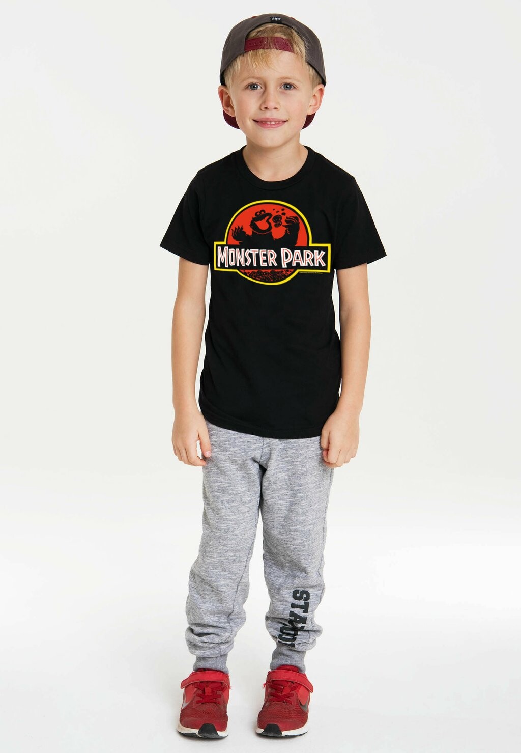 

Футболка с принтом SESAMSTRASSE KRÜMEL MONSTER PARK LOGOSHIRT, цвет schwarz