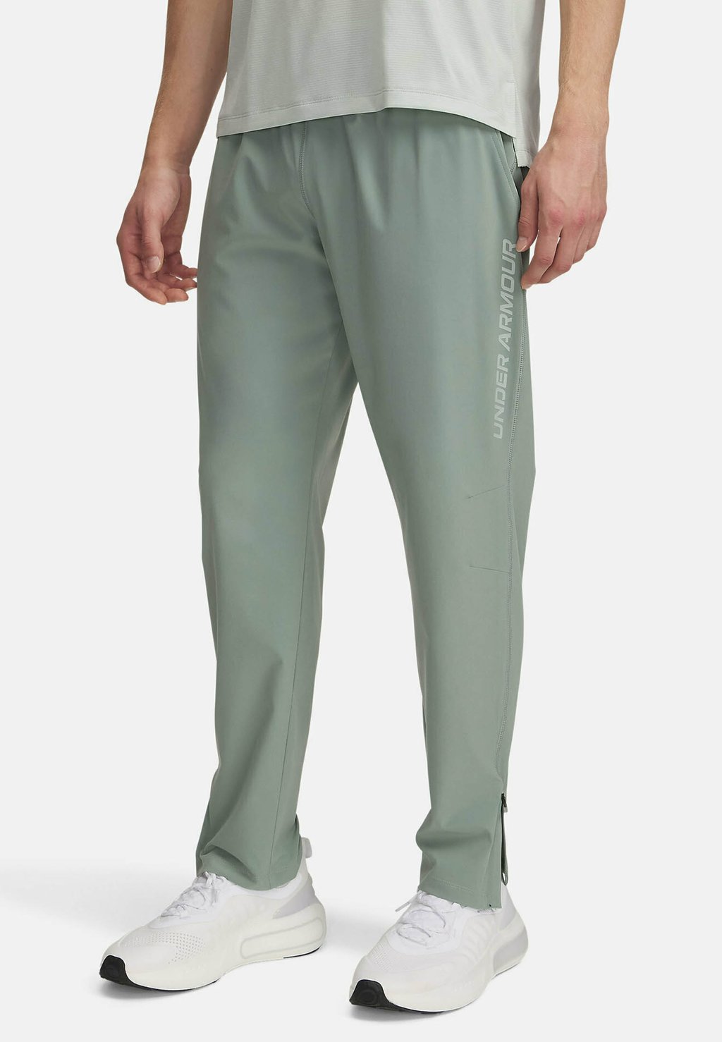 

Спортивные брюки STORM RUN Under Armour, зеленый