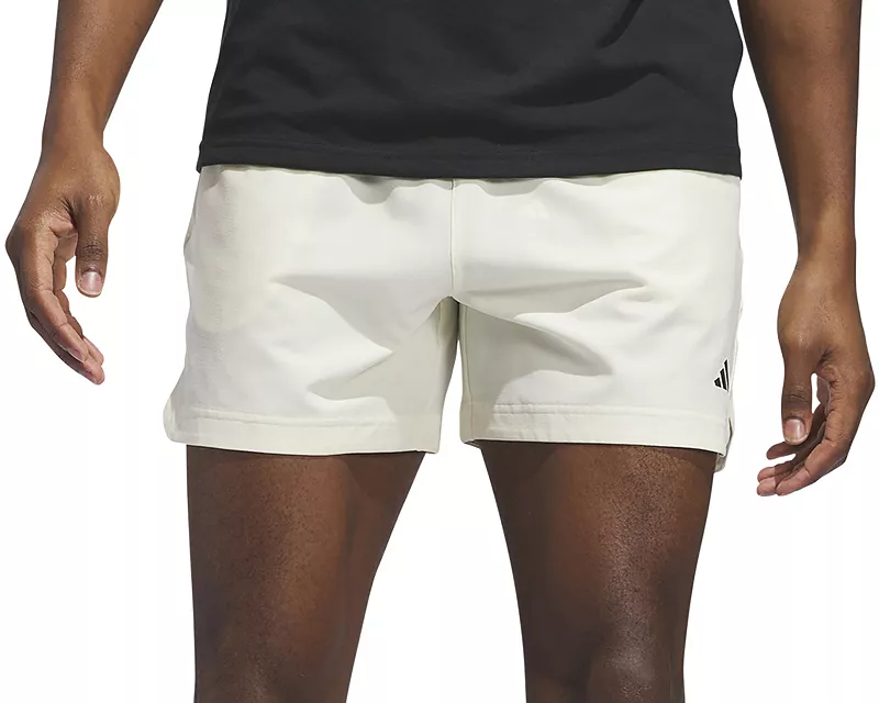 

Мужские 7-дюймовые шорты Adidas Axis из ткани, слоновая кость