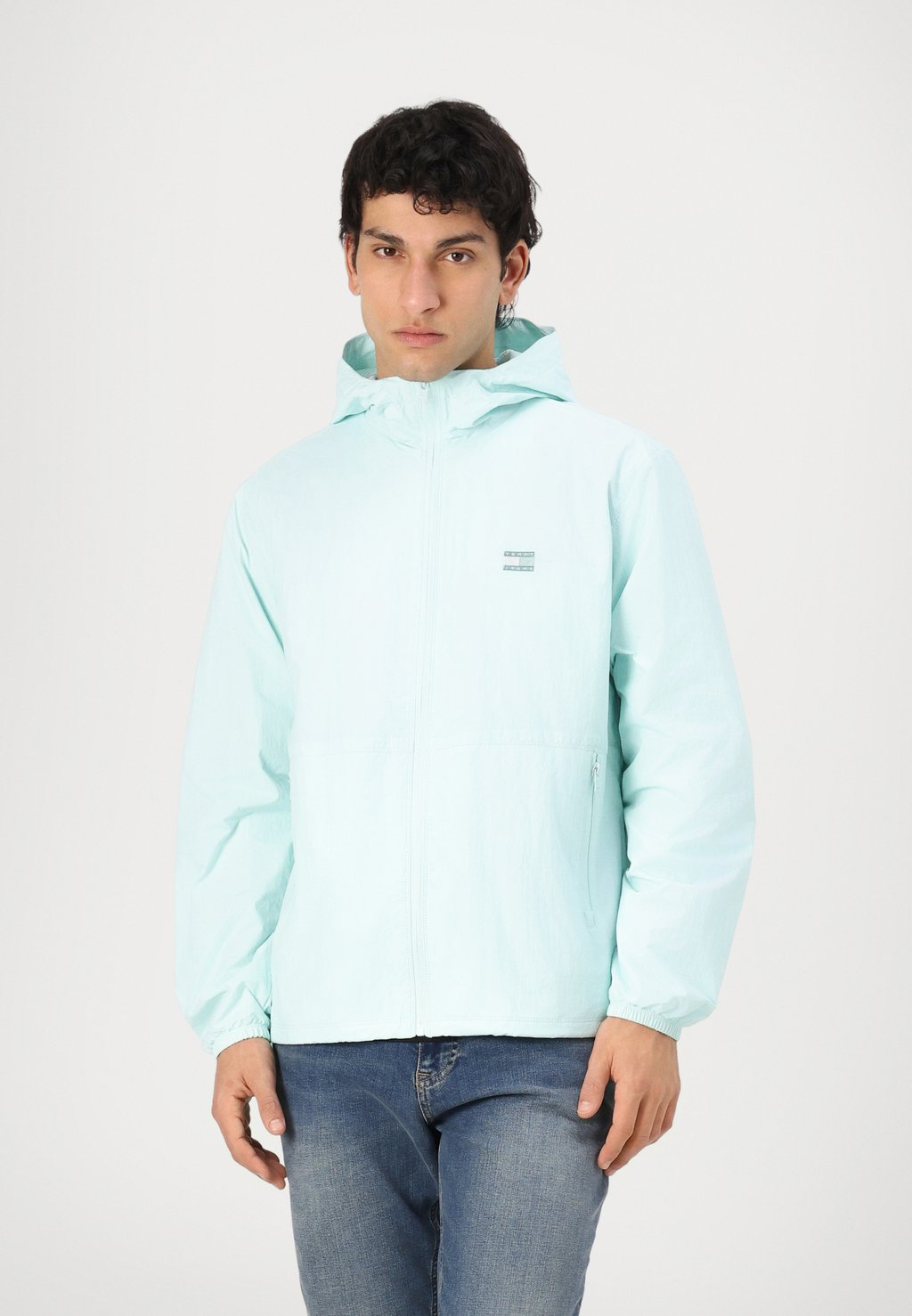 

Ветровка TJM EXT Tommy Jeans, бирюзовый
