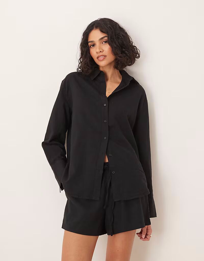 

Льняная рубашка Gina Tricot с длинными рукавами черного цвета