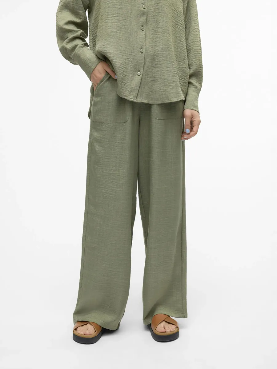 

Брюки-слипоны Vero Moda "VMMELANEY HW LOOSE PANT WVN GA NOOS", цвет Laurel Wreath Detail:Melange