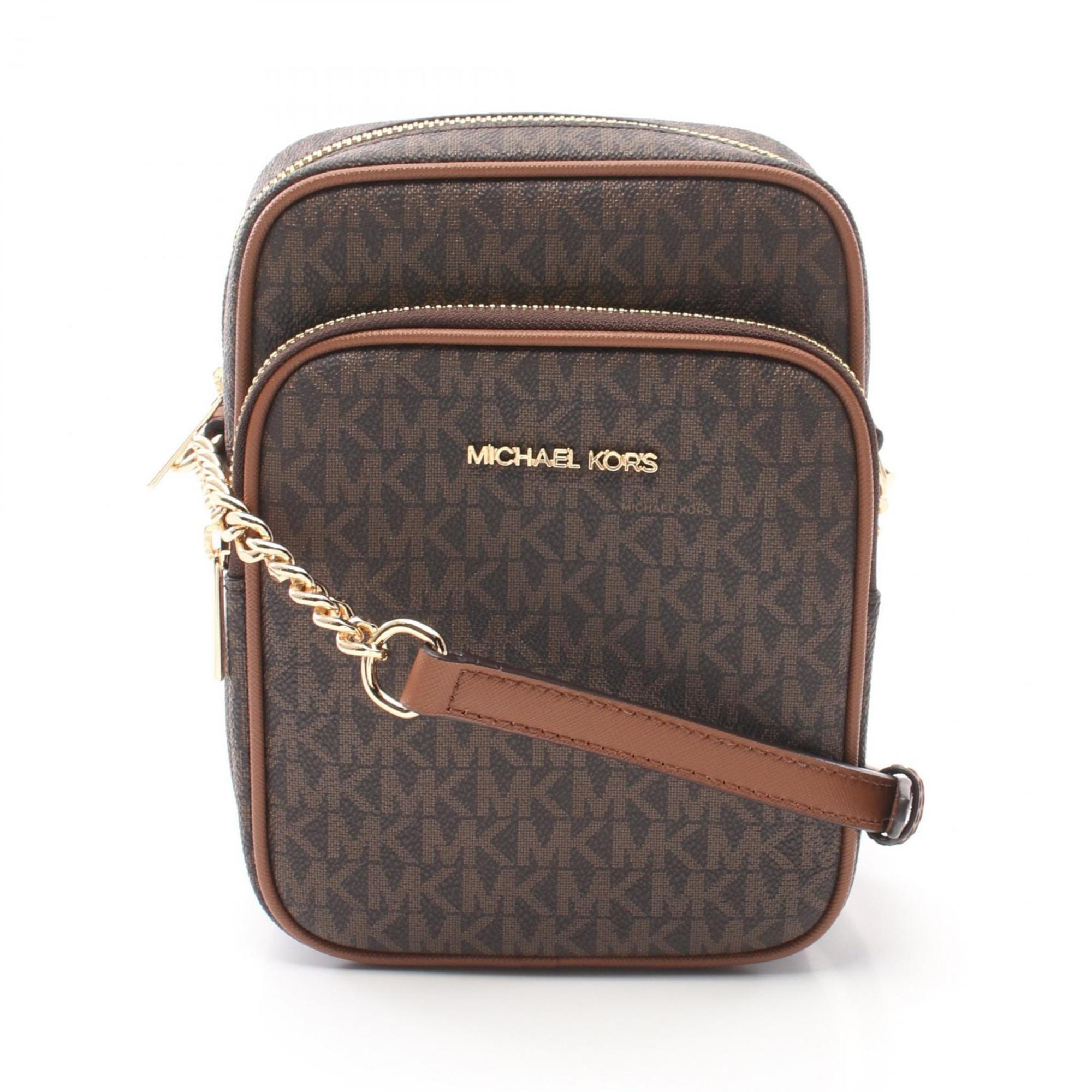 

Michael Kors Jet Set Дорожная сумка через плечо из кожи с покрытием Canvas Сумка на выходные, коричневый