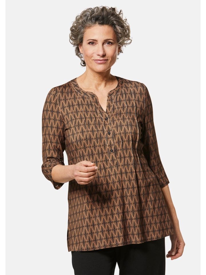 

Рубашка-туника с принтом. Рубашка-туника с принтом, подчеркивающая фигуру, в черно-молочном цвете. GOLDNER