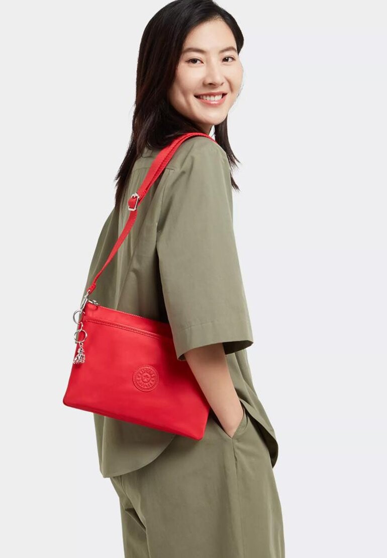 

Сумка через плечо Riri L Kipling, цвет party pink paka