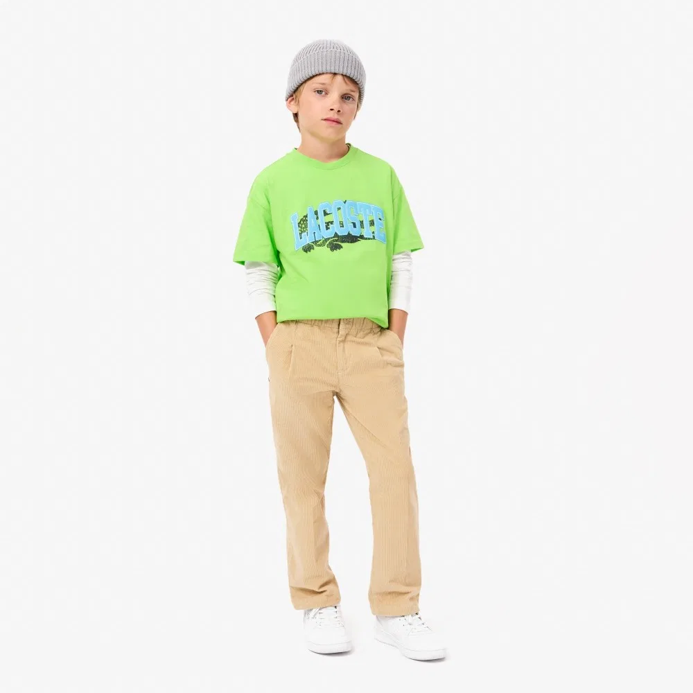 Детские вельветовые брюки бежевые от Lacoste — фото 2