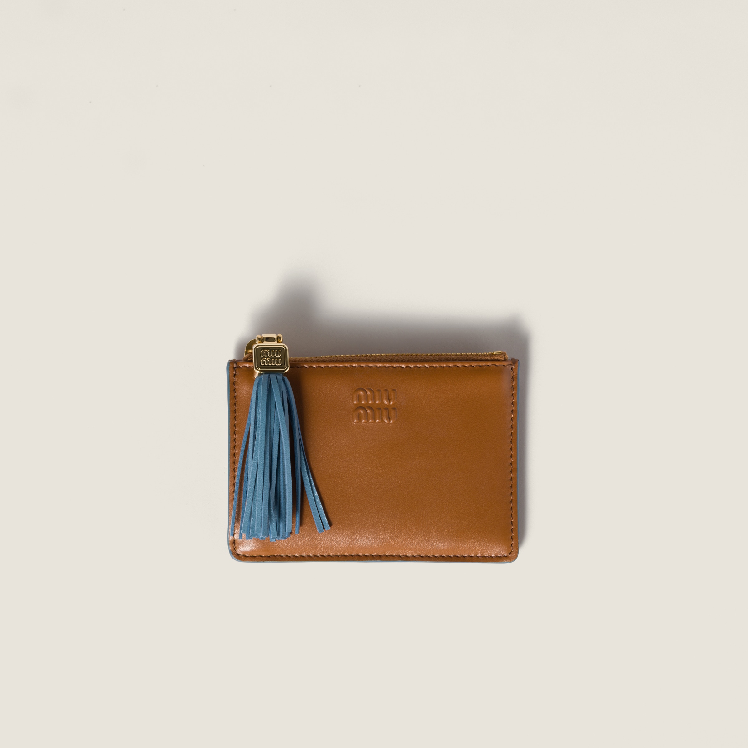 

Кожаный держатель для карт MIU MIU, коньячный/астральный синий