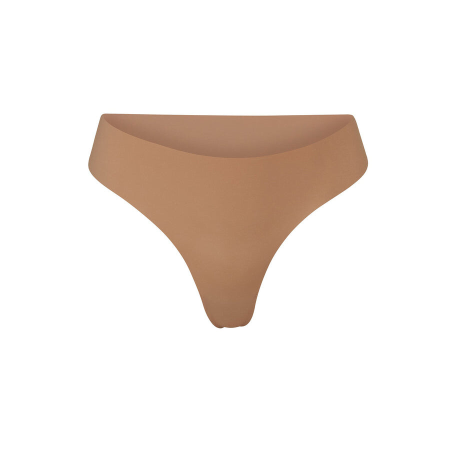 

Стринги с окучиванием SKIMS Naked, цвет Sienna