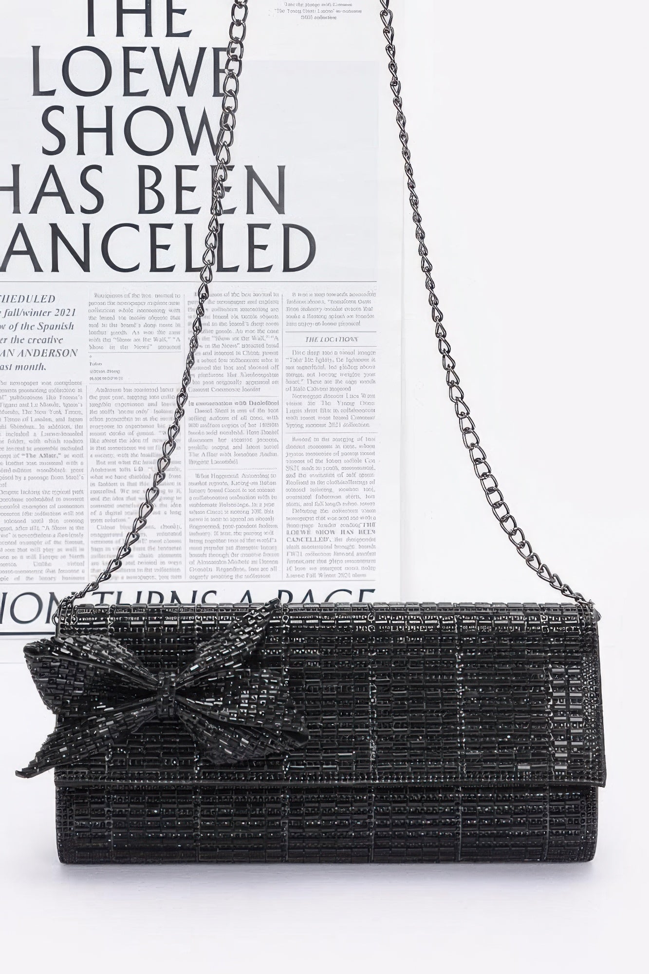 

Блестящий вечерний клатч с бантом из страз FASHNZFAB