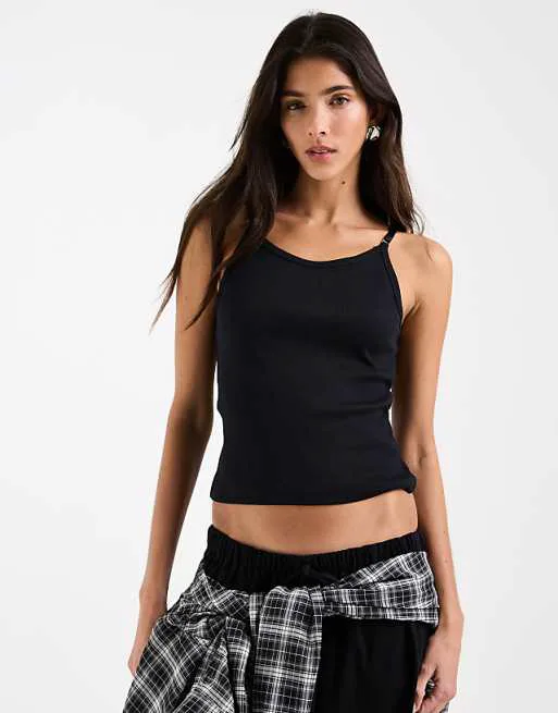 

Черный жилет в рубчик с овальным вырезом и ремешками ASOS DESIGN