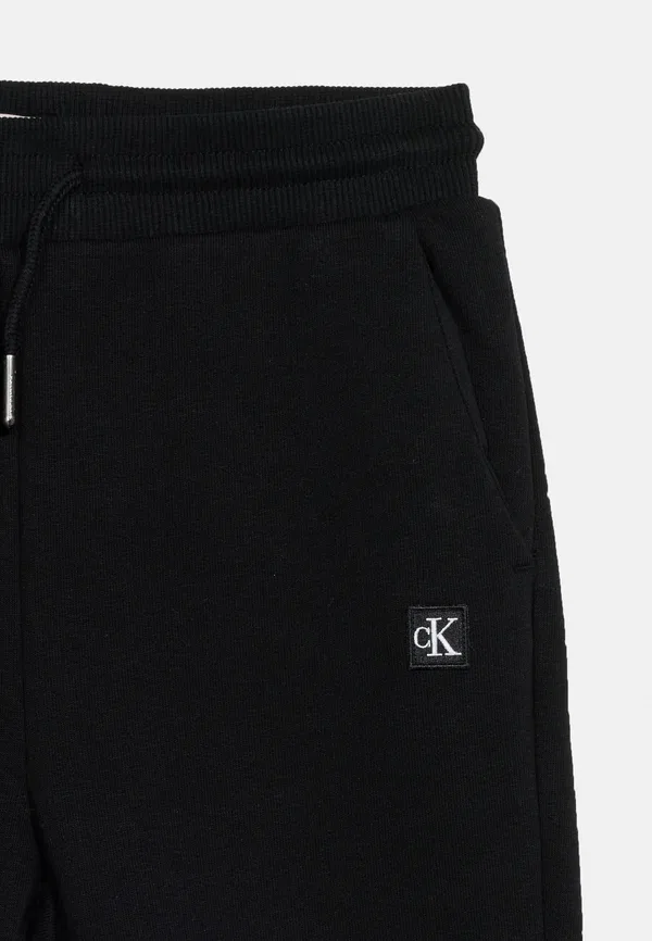 Спортивные штаны с мини-нашивкой Calvin Klein Jeans, черный — фото 3