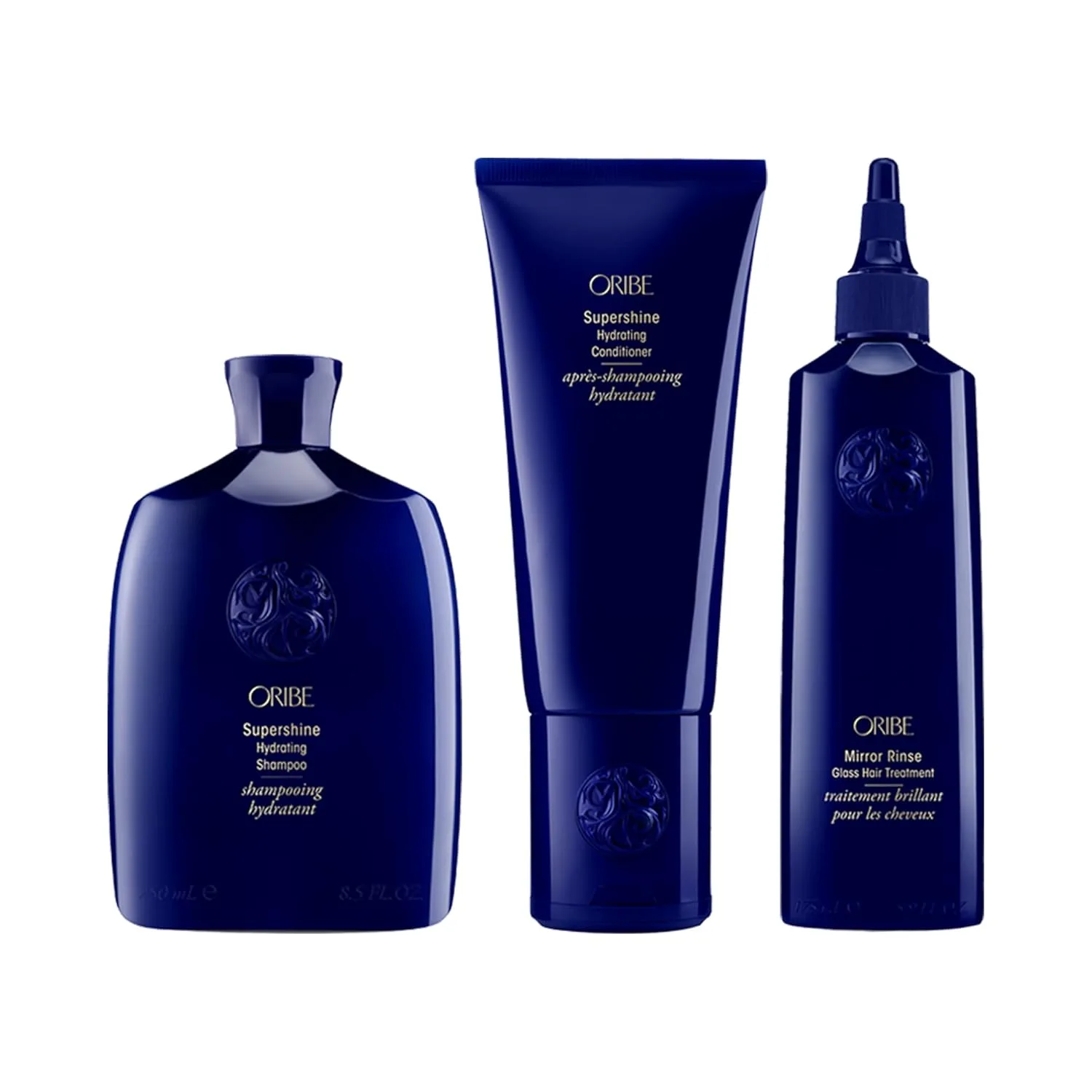 Набор ORIBE Supershine: шампунь, кондиционер Supershine и средство для ополаскивания Mirror Rinse.