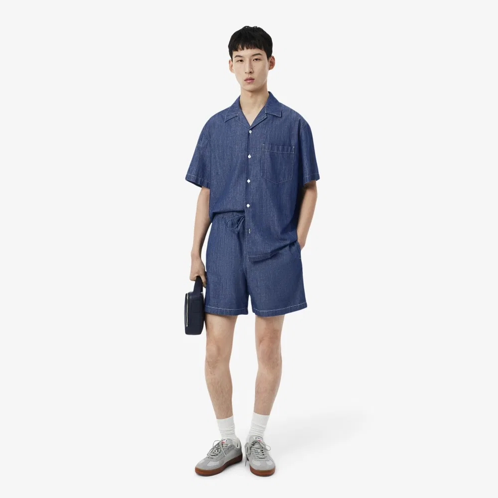Мужские джинсовые шорты свободного кроя тёмно-синие от Lacoste