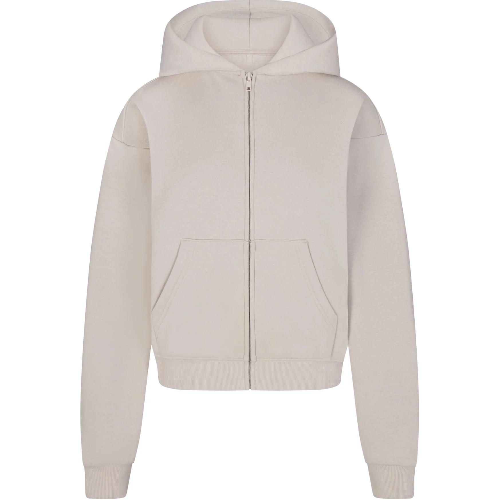 

Толстовка с капюшоном на молнии SKIMS COTTON FLEECE CLASSIC ZIP UP HOODIE женская цвет камень