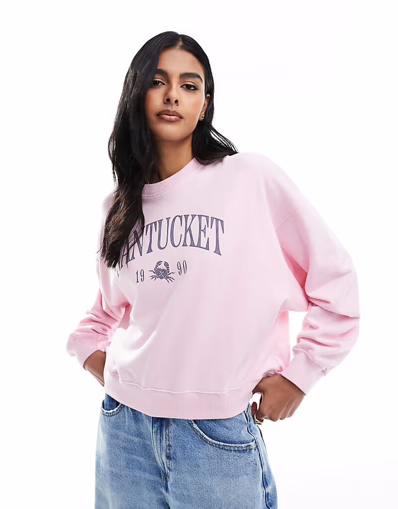 

Толстовка Hollister с круглым вырезом спереди и графическим принтом в пыльно-розовом цвете