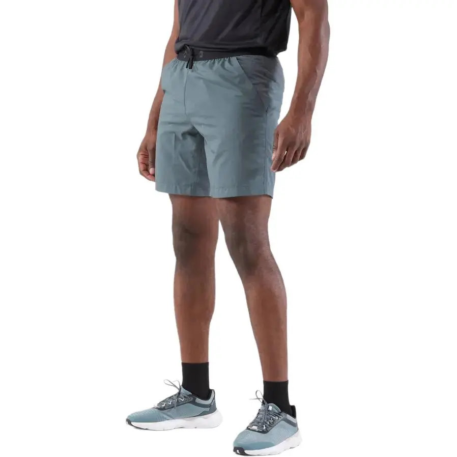 

KIPRUN Спортивные шорты мужские темно-серые зеленые DECATHLON