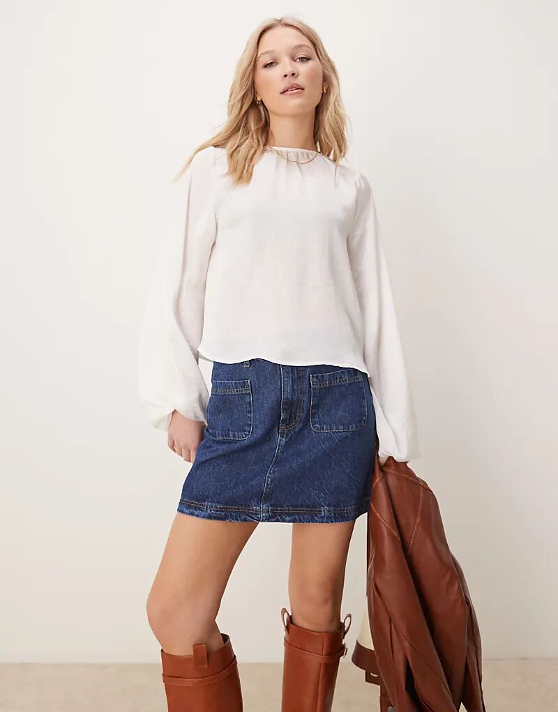 

Джинсовая мини-юбка с накладными карманами ASOS DESIGN цвета индиго