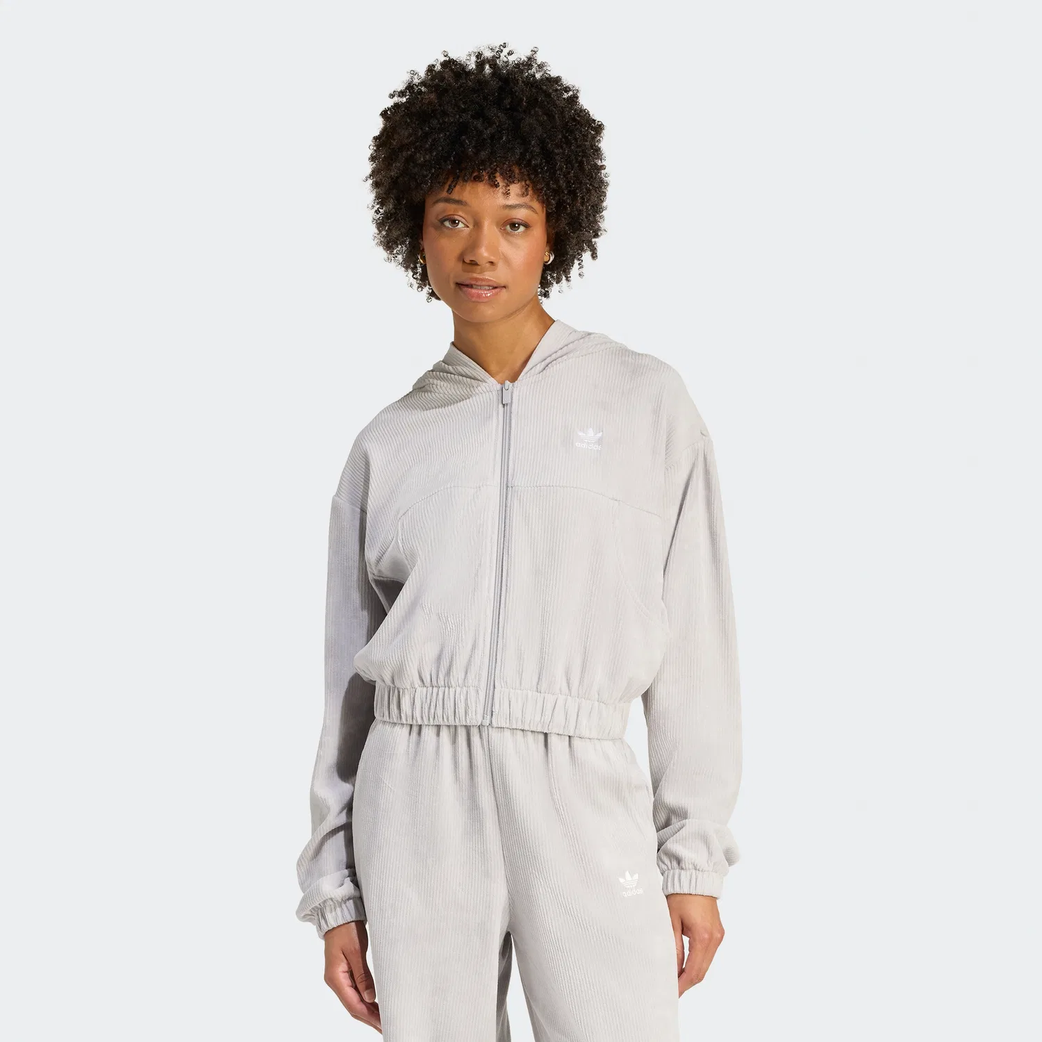 Женская спортивная куртка Essential Chenille серого цвета от Adidas
