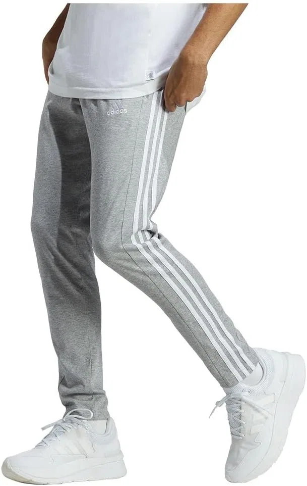 adidas - Спортивные брюки Essentials Single Jersey Tapered Open Hem 3-Stripes для мужчин