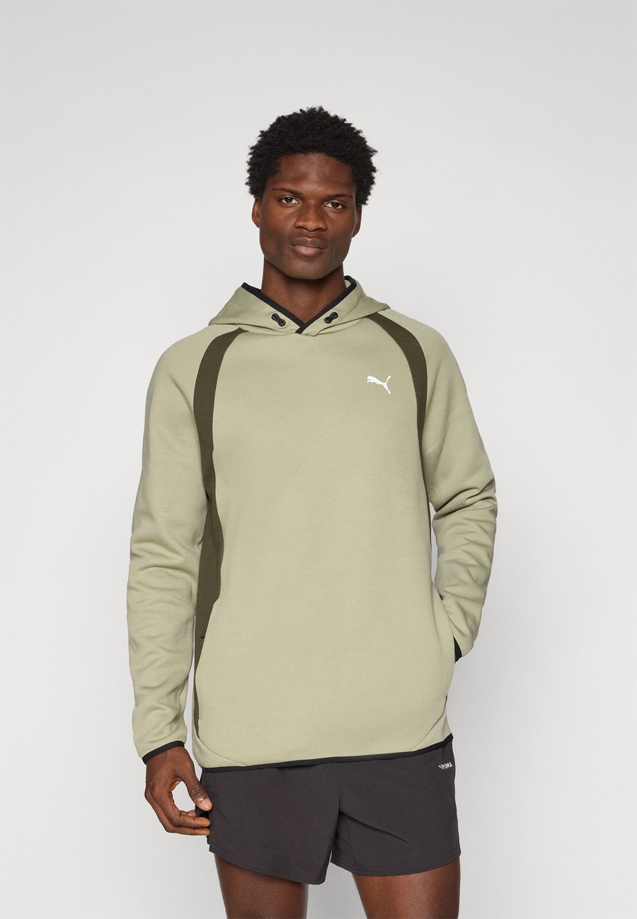 

Худи Puma EVOSTRIPE HOODIE, Lux Army/Khaki