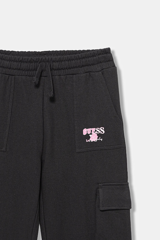 Детские хлопковые спортивные брюки Guess, черный — фото 3