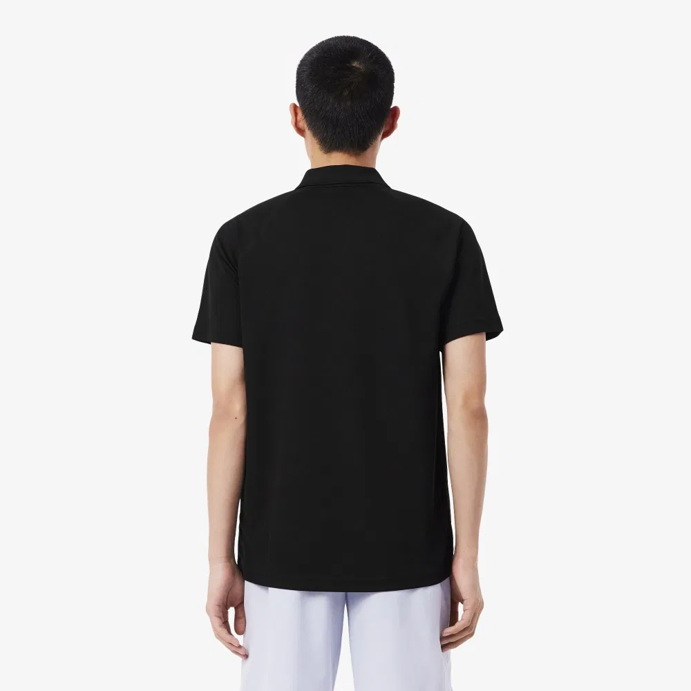Мужская чёрная базовая футболка-поло с рукавами реглан от Lacoste — фото 3