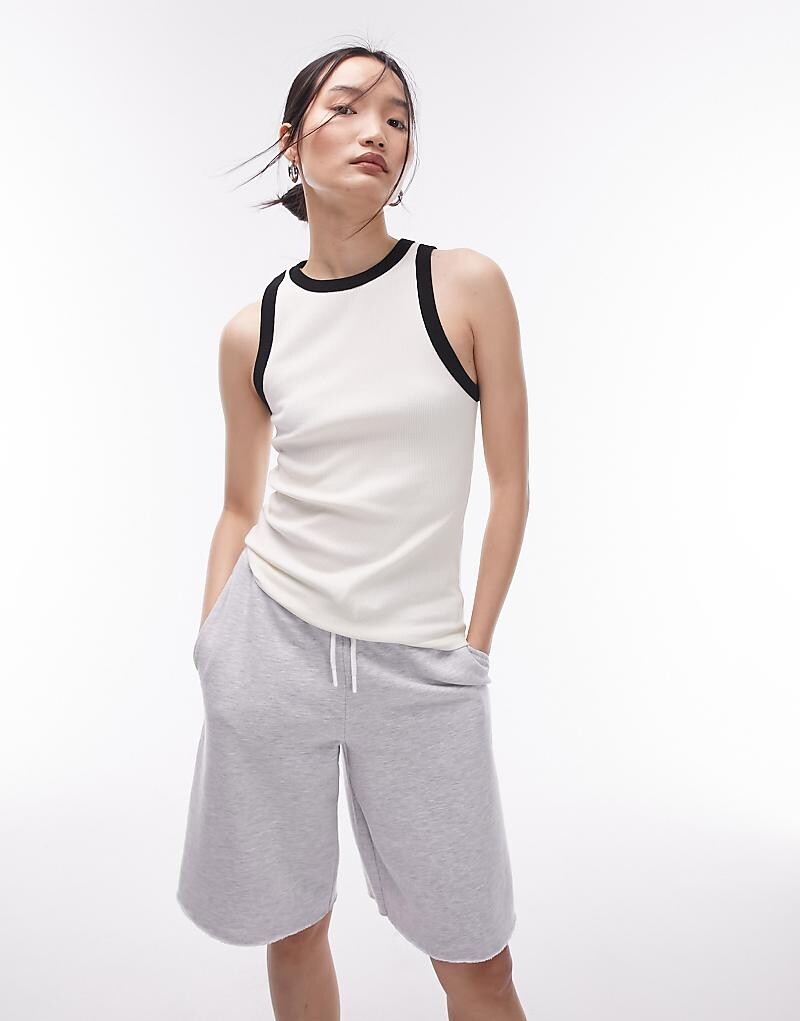 

Белая узкая майка в контрастную рубчику Topshop