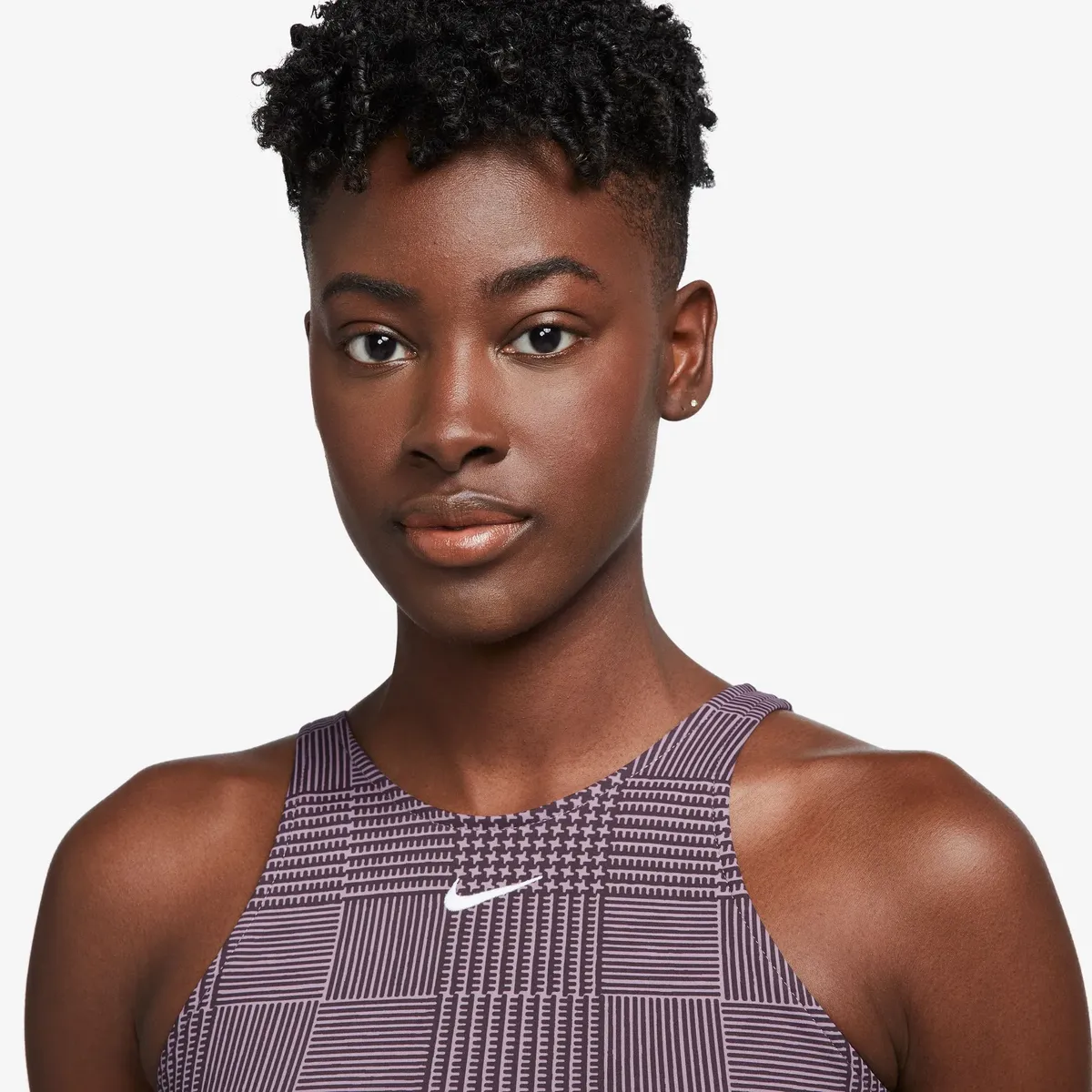 

Майка для йоги Nike "ЖЕНСКАЯ УКОРОЧЕННАЯ МАЙКА YOGA DRI-FIT", цвет Violet Dust/Violet Dust/White