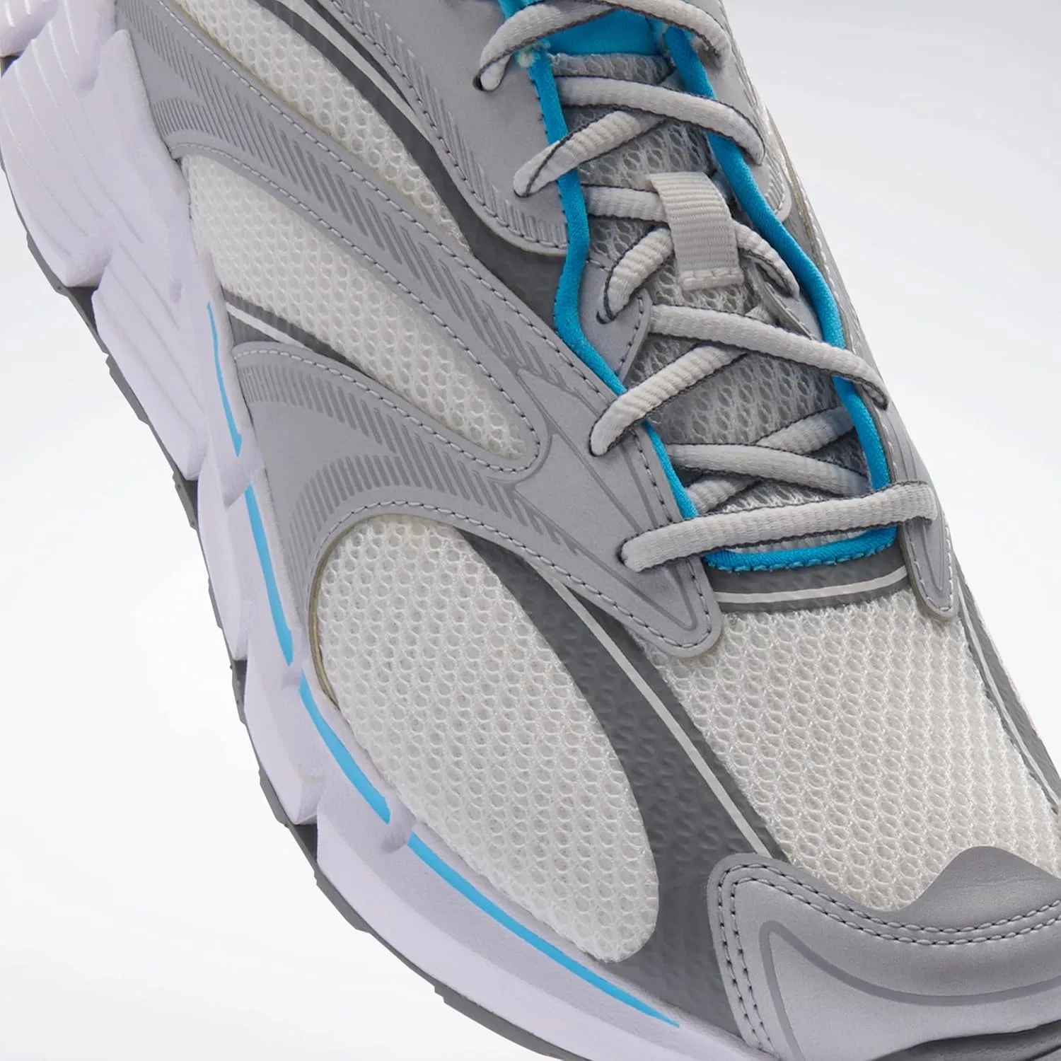 Кроссовки Reebok Zig Hypnotica унисекс, Ftwr White Future Cyan Barely Grey — фото 2