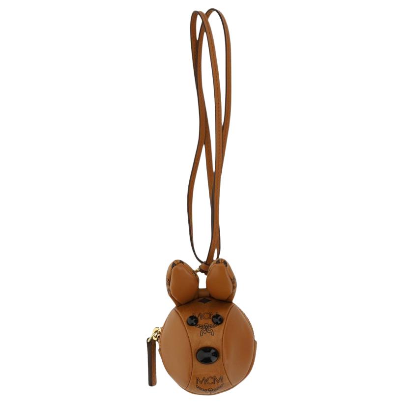 

Женская коричневая плечевая сумка из холста и кожи наппа MCM