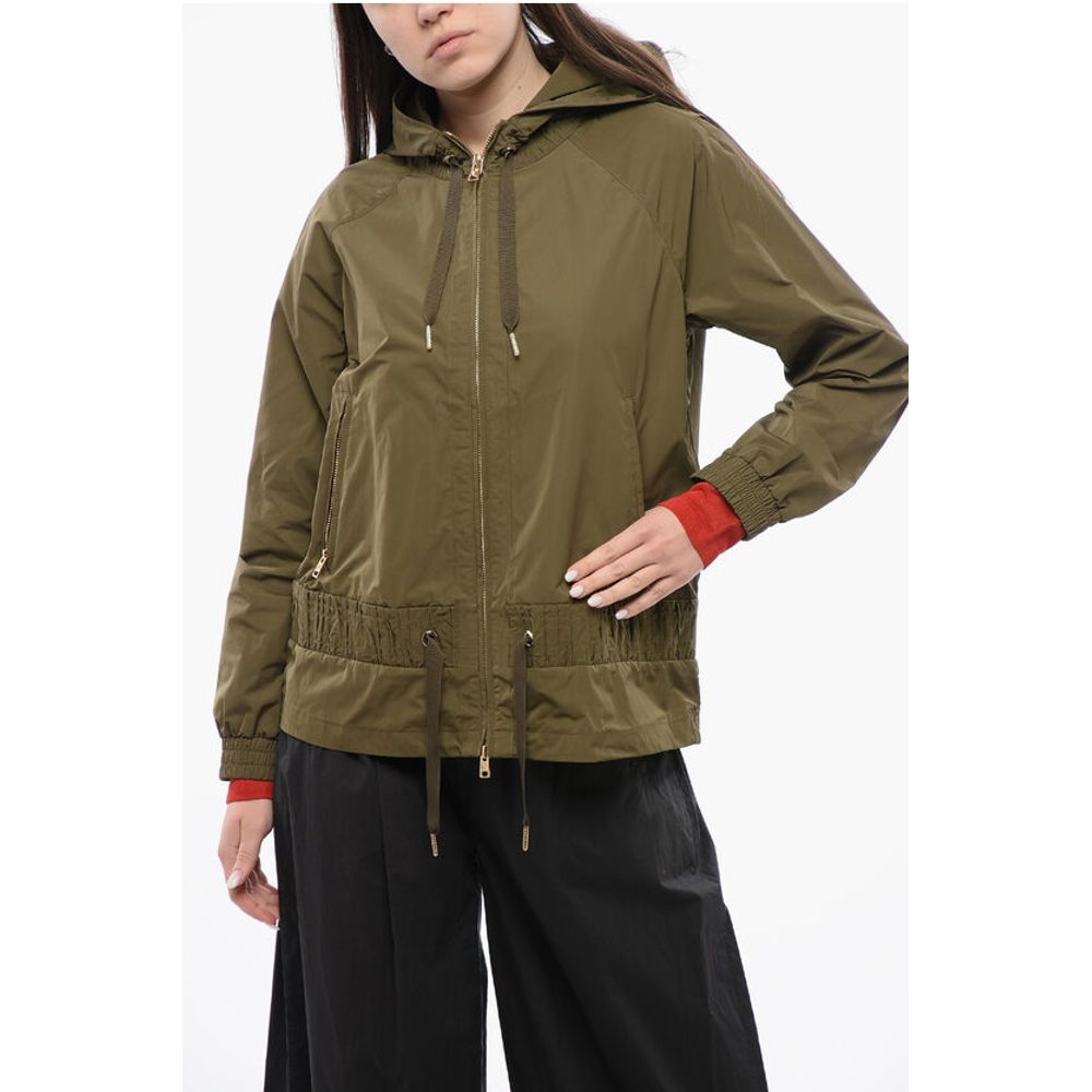 

Зеленые куртки и пальто из полиэстера Woolrich, Green