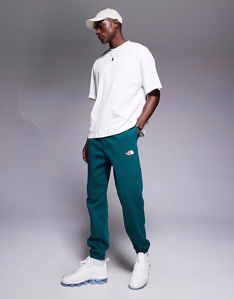 

Спортивные брюки North Face Simple Dome с логотипом темно-зеленого цвета