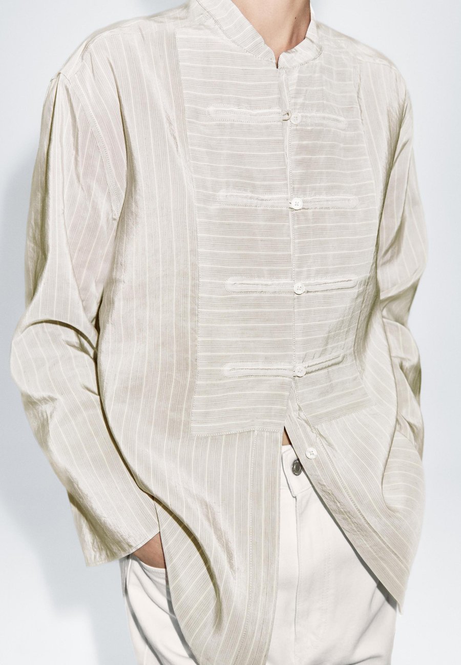 

Блуза Massimo Dutti STRIPED OVERSIZE GARMENT WITH STAND COLLAR, White