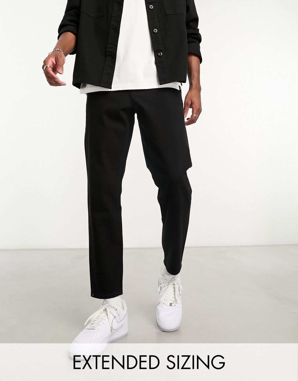 

Черные классические жесткие джинсы ASOS DESIGN