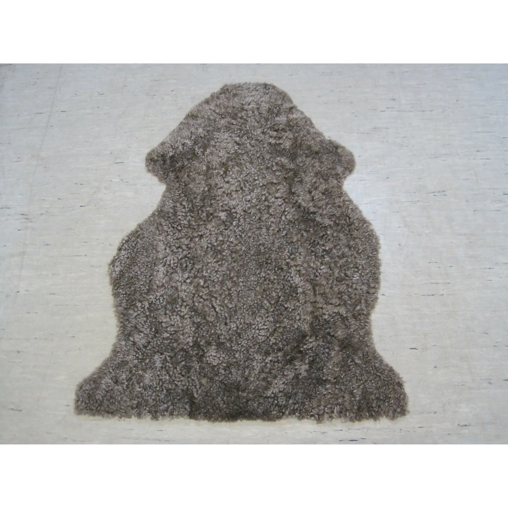 

Меховой ковер Heitmann Felle «Lambskin Curly», в форме меха, высота 25 мм, натуральная кожа ягненка с естественным завитком, стриженный, мягкий и приятный, цвет braun / hellbraune Spitzen