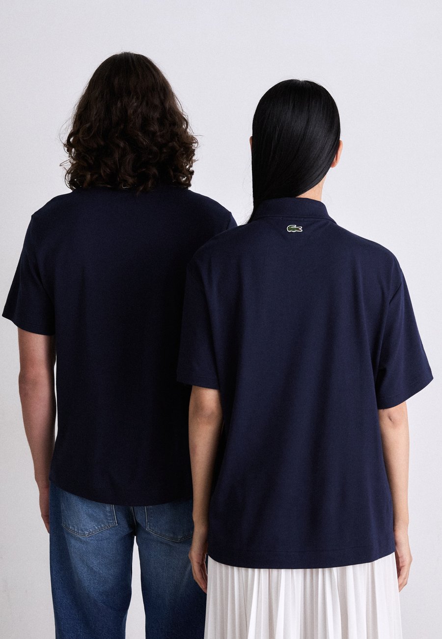 Поло Lacoste Unisex, Navy Blue, однотонное — фото 3