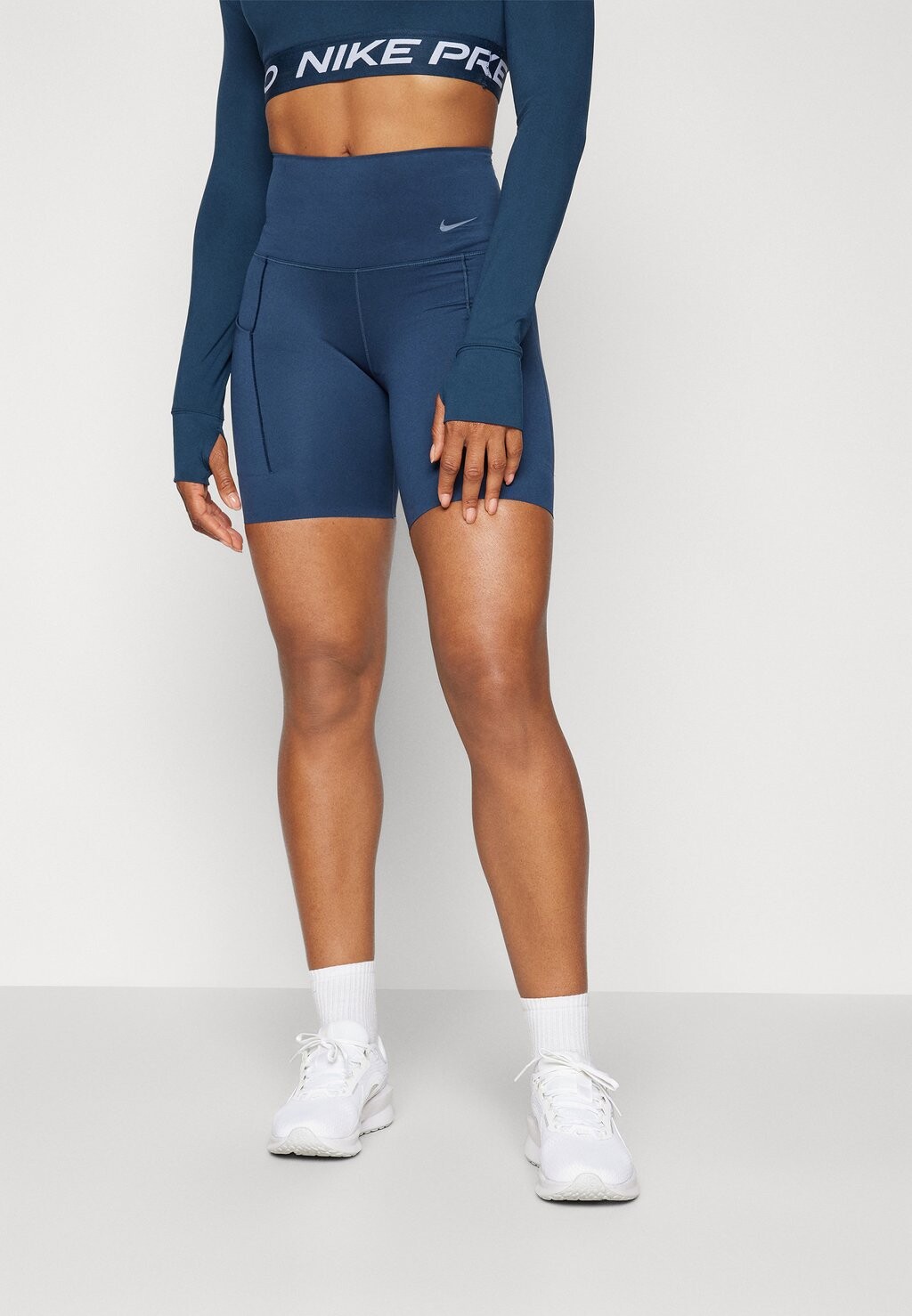 

Тайтсы GO SHORT Nike, синий