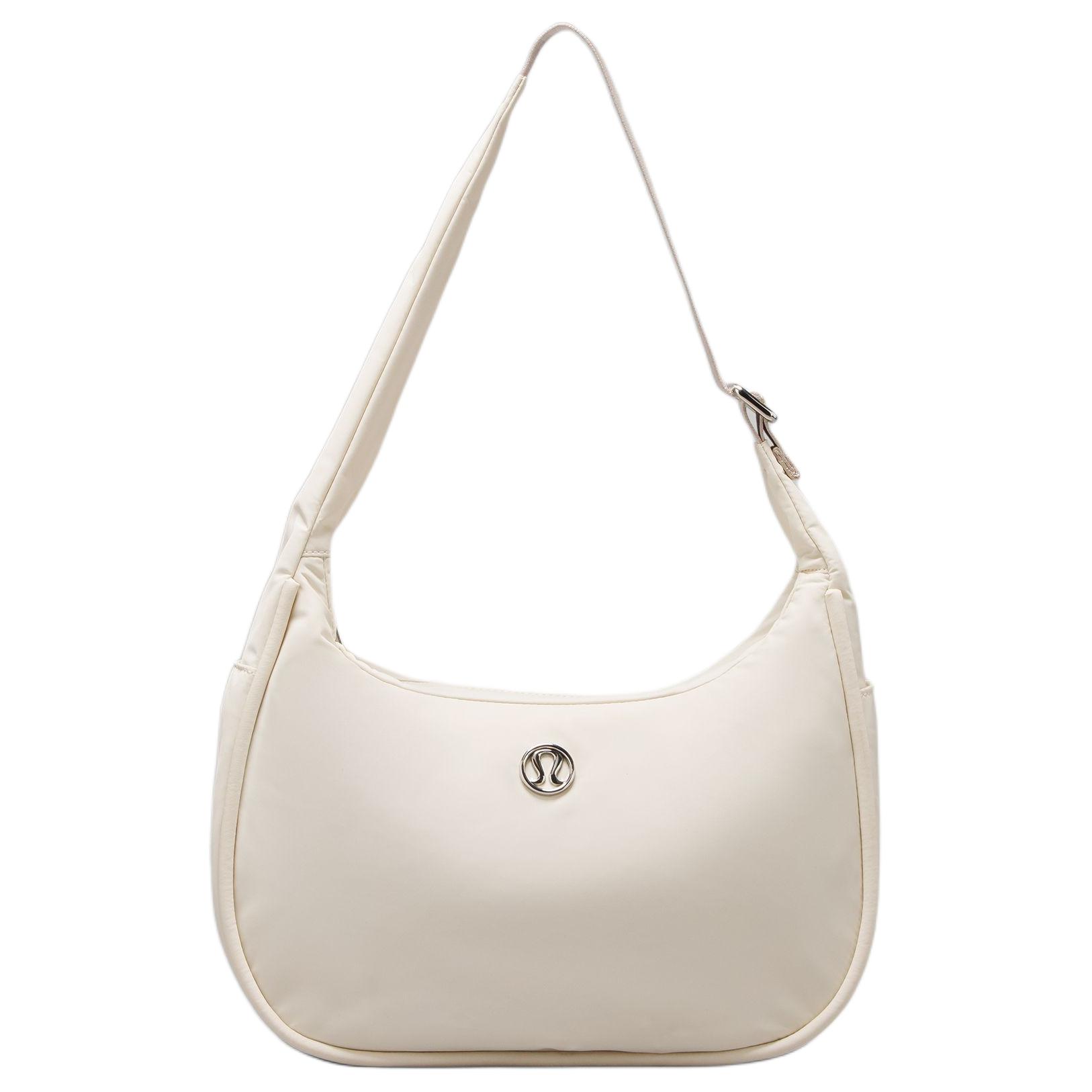 

Lululemon Переработанный нейлон с переработанным полиэстером женская мини-сумка через плечо сиренево-фиолетовый желтый, Wisteria Purple Yellow