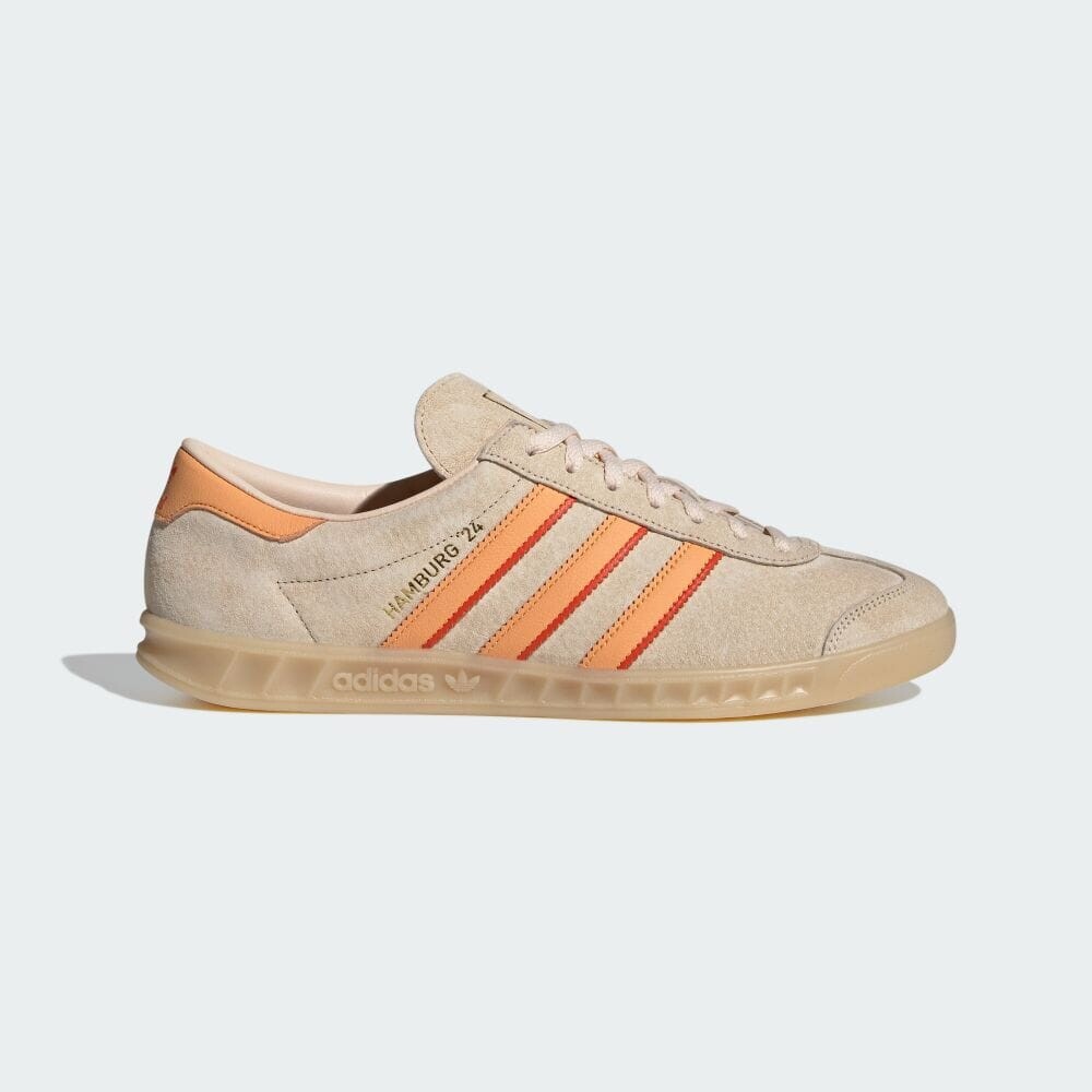 

Кроссовки Adidas HAMBURG 24, цвет Crystal Sand/Hazy Orange/College Orange