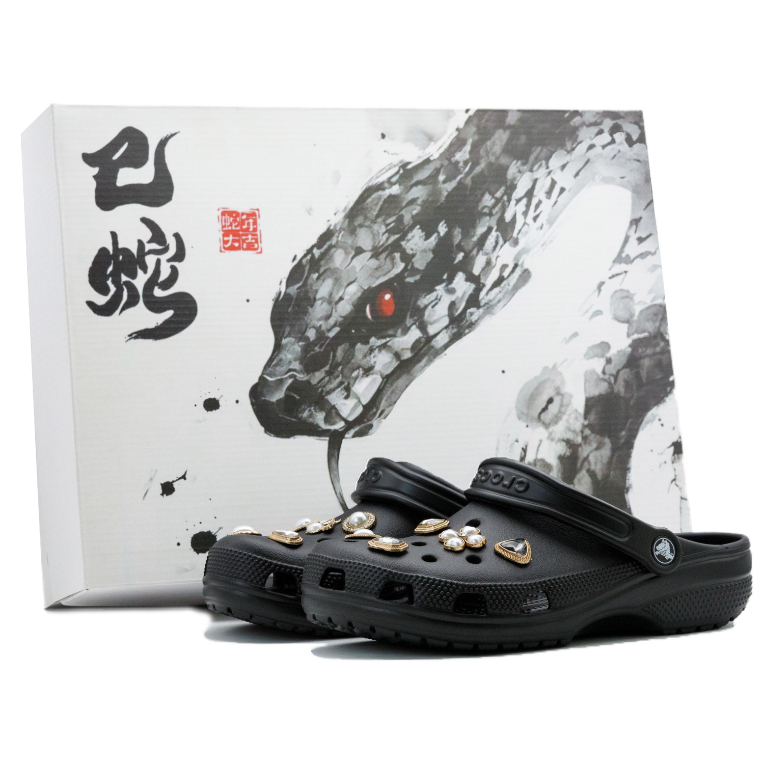 

Crocs Классические клоги унисекс черные - сверкающая черная змея с золотом в коробке, цвет Sparkling Black Gold Snake Box