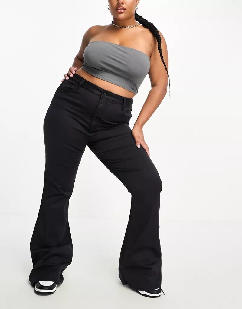 

Черные эластичные расклешенные джинсы ASOS DESIGN Curve