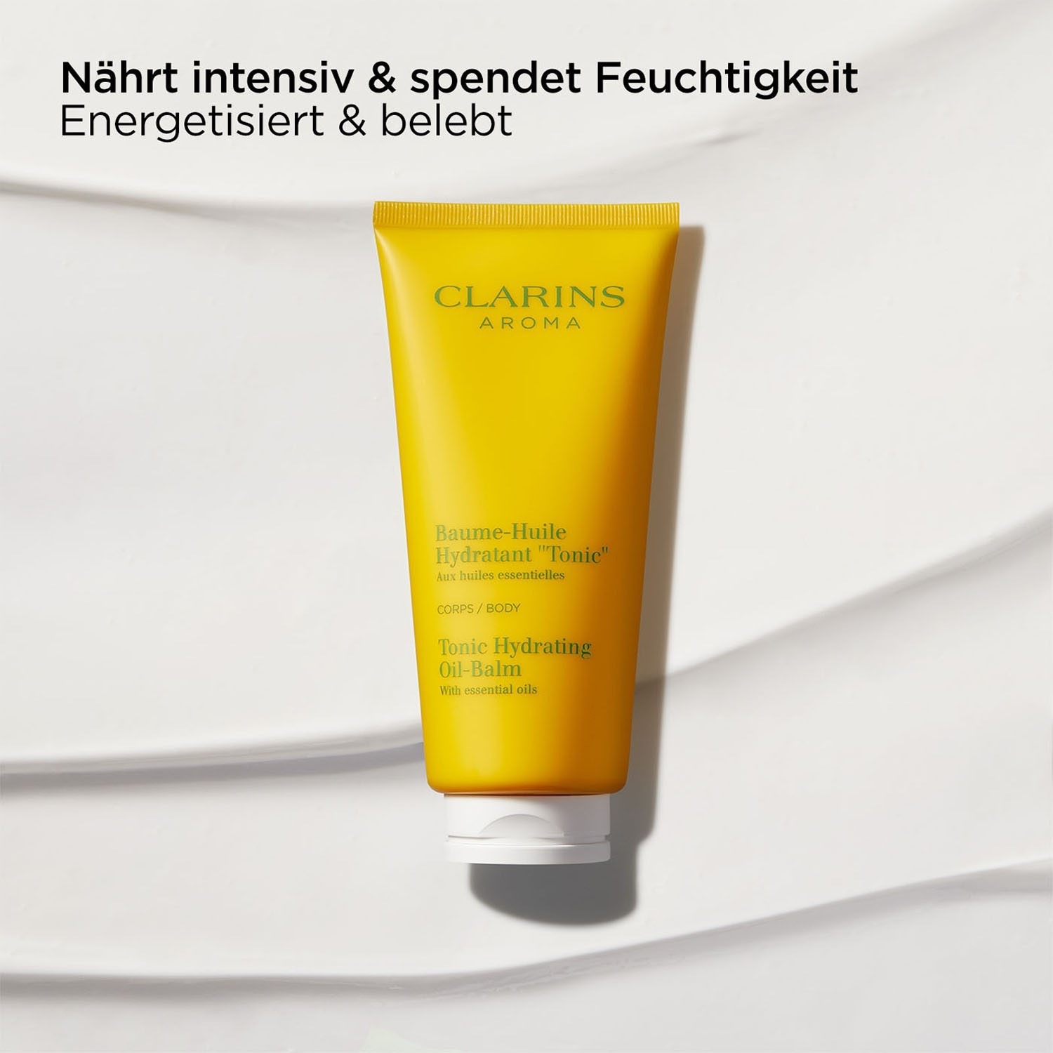 Масло для тела aromaphytocare baume-huile hydratant tonic Clarins, объем 200 мл — фото 3
