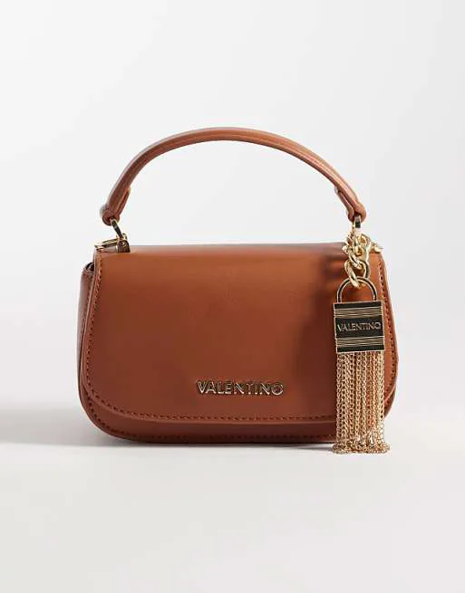 

Сумка Valentino Iride с верхней ручкой, съемным ремешком через плечо и золотой фурнитурой коричневого цвета - КОРИЧНЕВЫЙ