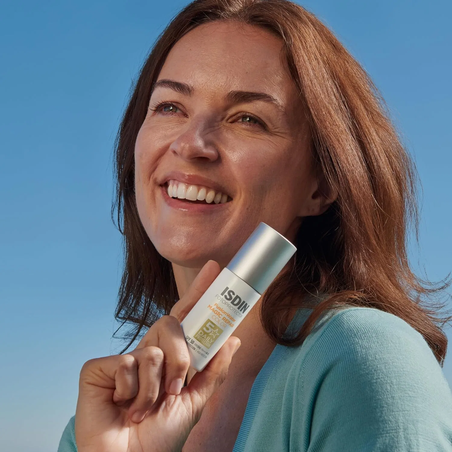 Тонирующий антивозрастной солнцезащитный крем ISDIN Fusion Water Magic Repair Colour SPF 50 Isdin — фото 2