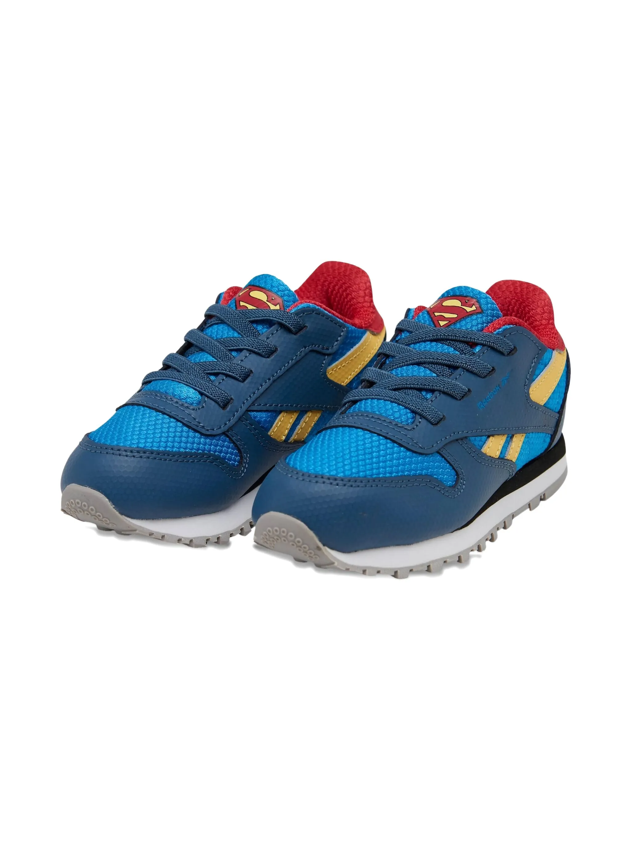 

Кроссовки Classic Leather TD DC Comics - Superboy and Supergirl Reebok Kids, синий