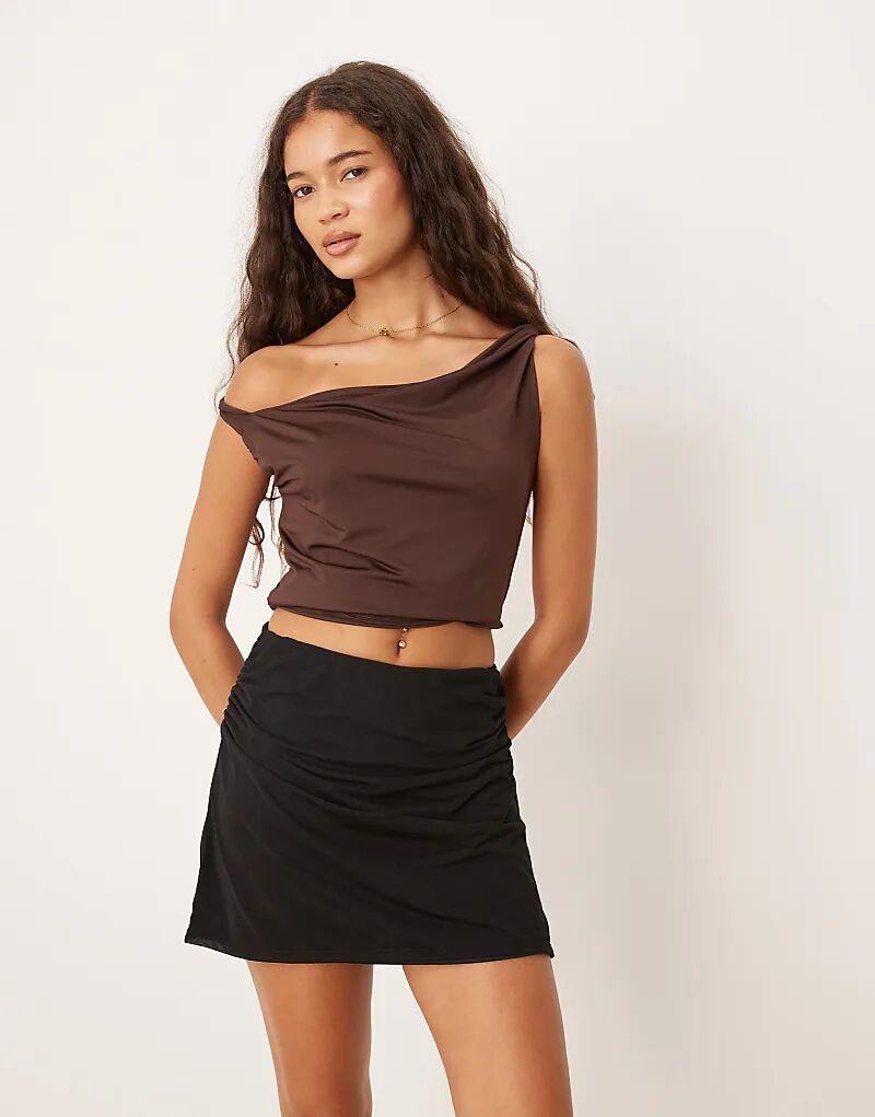 

Черная мини-юбка из сетчатой ткани с рюшами от ASOS DESIGN